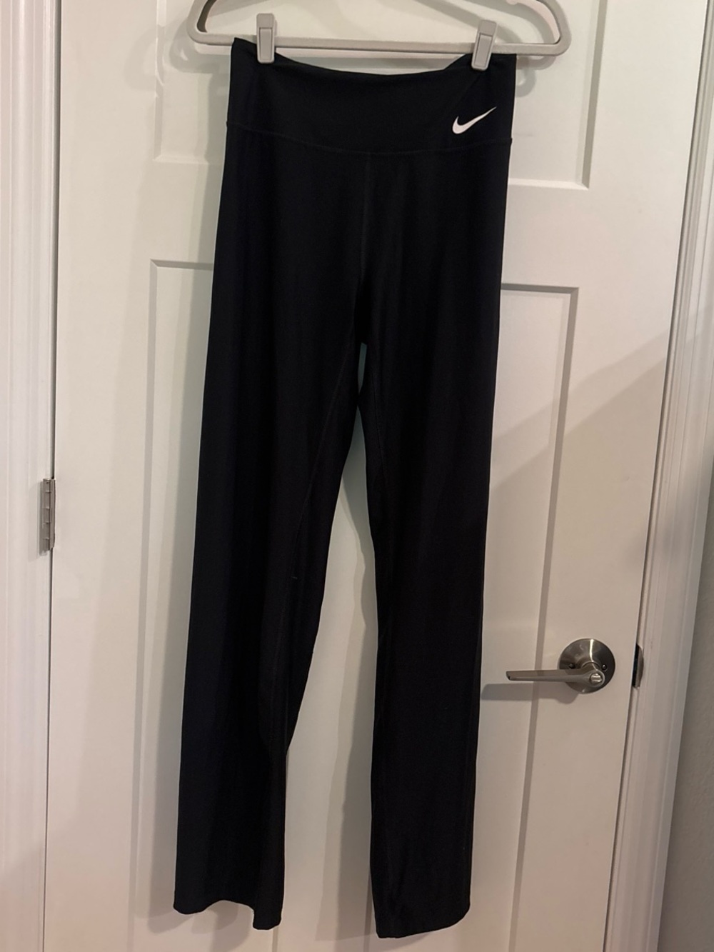 Nike
Black Leggings with White Swoosh